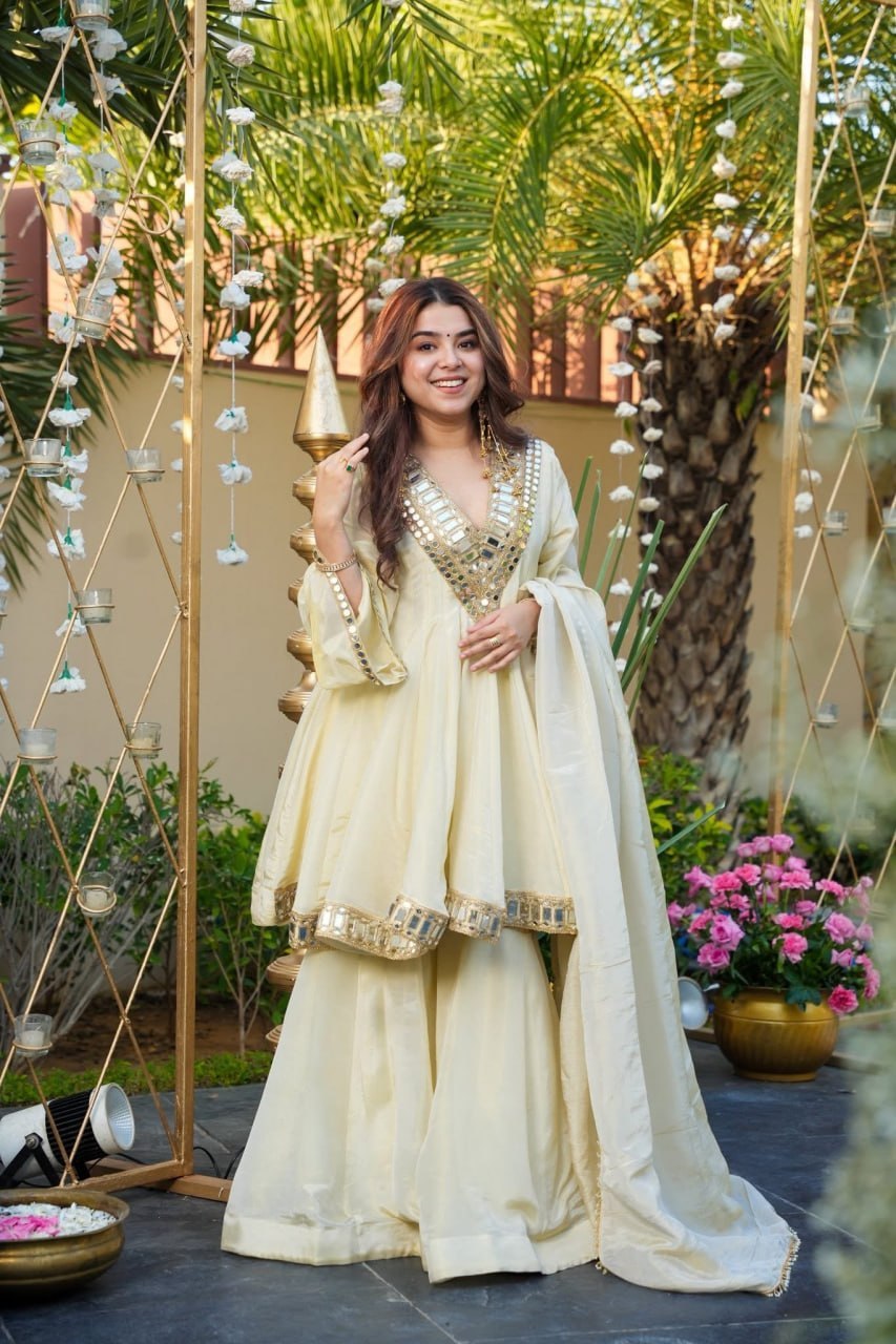 Women's Silk Anarkali Kurta Sharara Set with Dupatta I Festive & Wedding Wear | Cream Solid V-Neck Long Sleeve Ethnic Suit with Lace Mirror & Embroidery Work